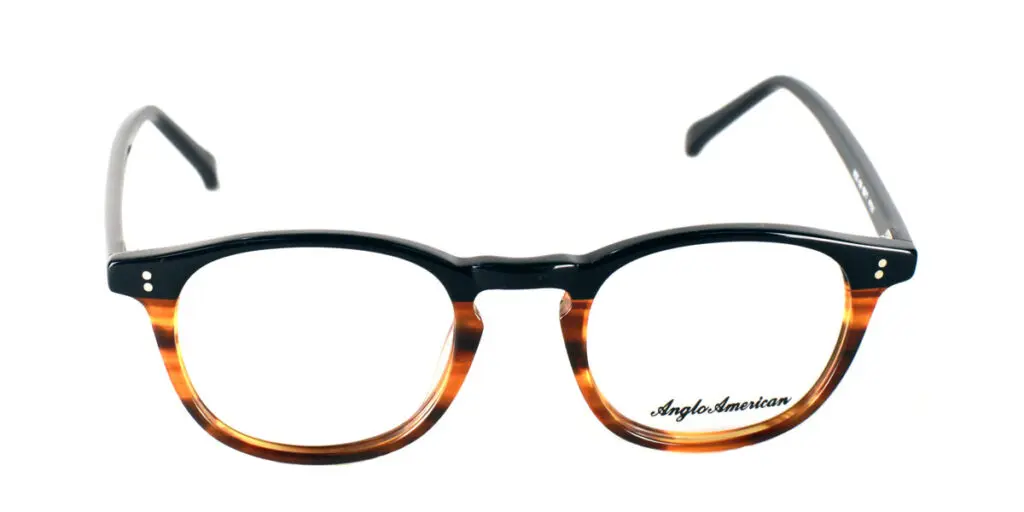 A pair of glasses is shown with the frame in focus.