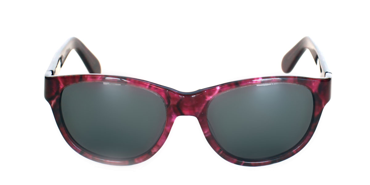 A pair of sunglasses with pink frames and green lenses.