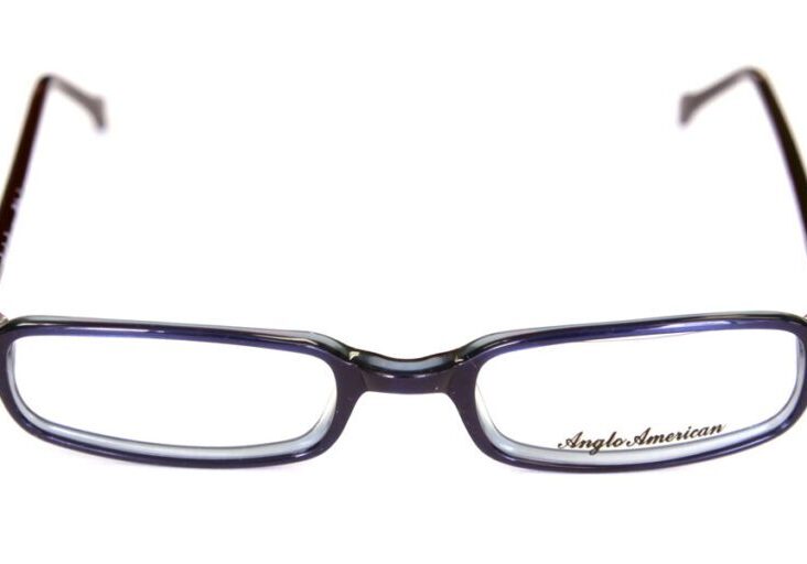 A pair of glasses is shown with the reflection of the image.