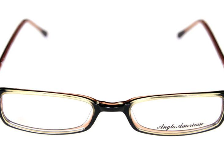 A pair of glasses with brown frames and black rims.