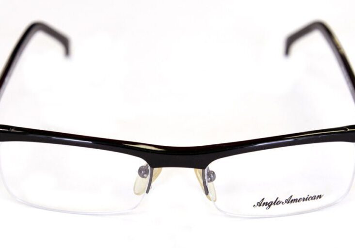 A pair of glasses with black frames and clear lenses.