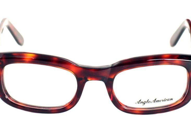 A pair of glasses is shown with the reflection of them.